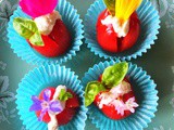 Cherry tomatoes with raw nut cheese and edible flowers