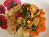 Spicy couscous with chickpeas, nuts and vegetables