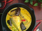 Sorsher diye Macher Jhal (Bangda with aubergines in mustard curry)