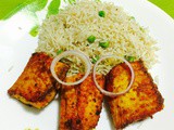 Shallow fried spiced fish with garlic pepper rice