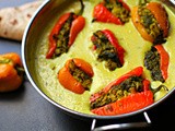 Curry of roasted sweet peppers filled with tofu and spinach, in a spiced cashew cream base