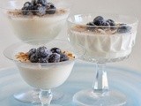 Coconut Infused Vanilla Bean Panna Cotta with Frosted Blueberries and Toasted Coconut