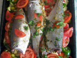 Moroccan baked stuffed fish with vegetables