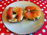 Scrambled eggs with smoked salmon on bagels