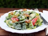 Caesar salad with smoked salmon and avocado