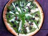 Green spring tart (with pistachios, pine nuts, asparagus, olives, brie…)