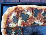 Summer-in-winter pizza with pesto, sofrito, chickpeas and artichoke hearts