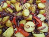 Potato, red onion, pepper and olive bake with cumin and chili flakes