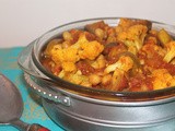 Stewed Indian-spiced eggplant, cauliflower, and chickpeas