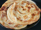 Kerala Style Parotta | Malabar Parotta | Layered Paratha Recipe(Step by Step + Video Recipe)