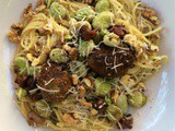 Spaghetti met salieboter, walnoten, cantharellen en tuinbonen