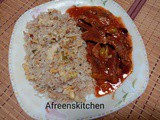 Pakistani style chilli garlic stir_fry beef strips with garlic and egg fried rice