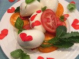 Caprese Salad with red impatiens flower dressing