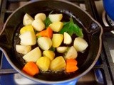 Potatoes and carrots with sage, rosemary and garlic, and do you know this flower