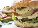 Parmesan Crusted Burgers with Grilled Onions and Tomatoes