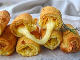 Cannoli di sfoglia con mozzarella impanata