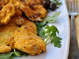 Cotolette di pollo con formaggio e olive