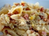 Pasta con cavolfiore e noci e prosciutto allo zafferano