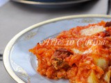 Risotto con salsiccia e zafferano al forno