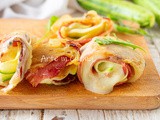 Rotolini speck e zucchine in padella