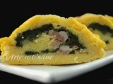 Rotolo di polenta farcito con spinaci e formaggi