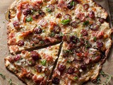 Rustic Pizza with Ham, Grapes, Shallots, Cheese, Honey & Thyme