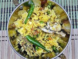 Bengali Murighnto - a pulao like side dish with fish head and rice
