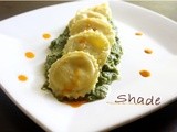 Ravioli di patate e bufala su crema di cime di rapa