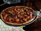 Multigrain pizza crust with charred, chili paneer topping