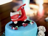 Of Swiss meringue buttercream, date-almond cake and a bright, red scooter