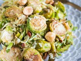 Brussels Sprouts Salad with Hazelnuts, Parmesan, and Pomegranate Molasses Vinaigrette