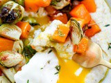 Creamy Goat Cheese Grits with Roasted Brussels Sprouts and Squash and Poached Eggs