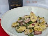 Tortellini con pancetta, piselli e crema al vino rosso