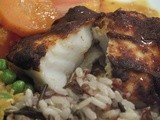 Tikka cod with lentil curry and mixed rice