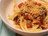 Pasta with Chicken and Mushrooms in Tomato Sauce