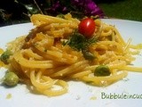 Spaghetti con fave, alici e mollica di pane