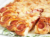 Homemade pizza with sausages