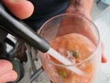 Strawberry infused vodka spritzer