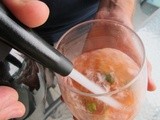 Strawberry infused vodka spritzer