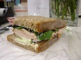A picture with deli turkey with cucumber and mixed greens
