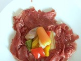 Carpaccio di carne salada con la giardiniera di gemma