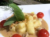 Gnocchi di patate al burro fuso con vongole e crema di pane