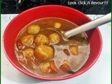 Parupuu urundai kuzhambu (Without onion) (Steamed lentil balls in tamrind stew)