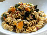 Pasta with Braised Kale, Butter Beans, and Hazelnuts