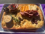 Focaccia transformed into an edible Charcuterie Board