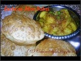 Luchi ar Aloo Sabzi (Fried Indian Flat Bread & Potato Curry)