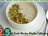 Shahi phirni with pistachios and fruit toppings