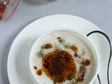 Turkish yogurt soup with rice, mint and paprika flakes