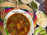 Aloo diye bhapa dimer jhol