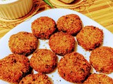 Crisp potato-peanut coins with dates-yogurt dip